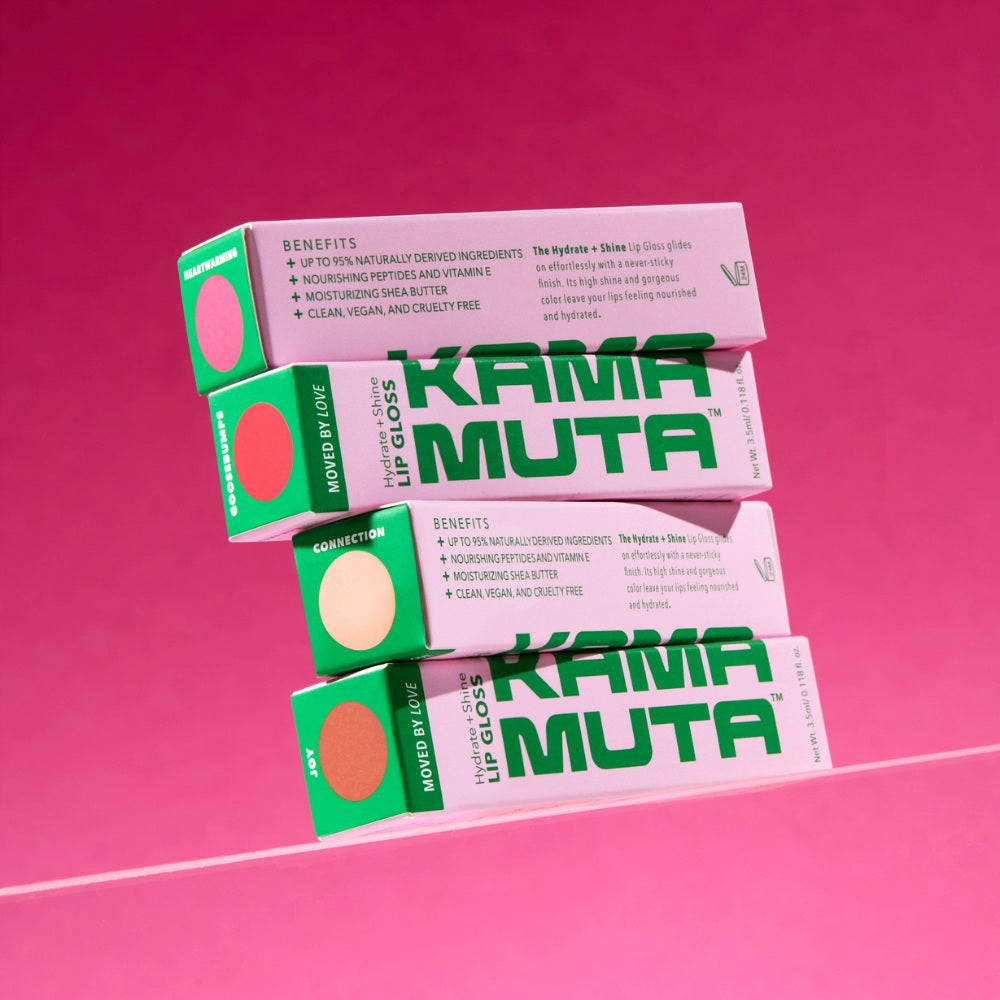 Kama Muta lip gloss boxes on a pink background