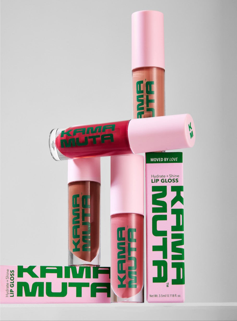 Kama Muta lip gloss bottles on a gray background