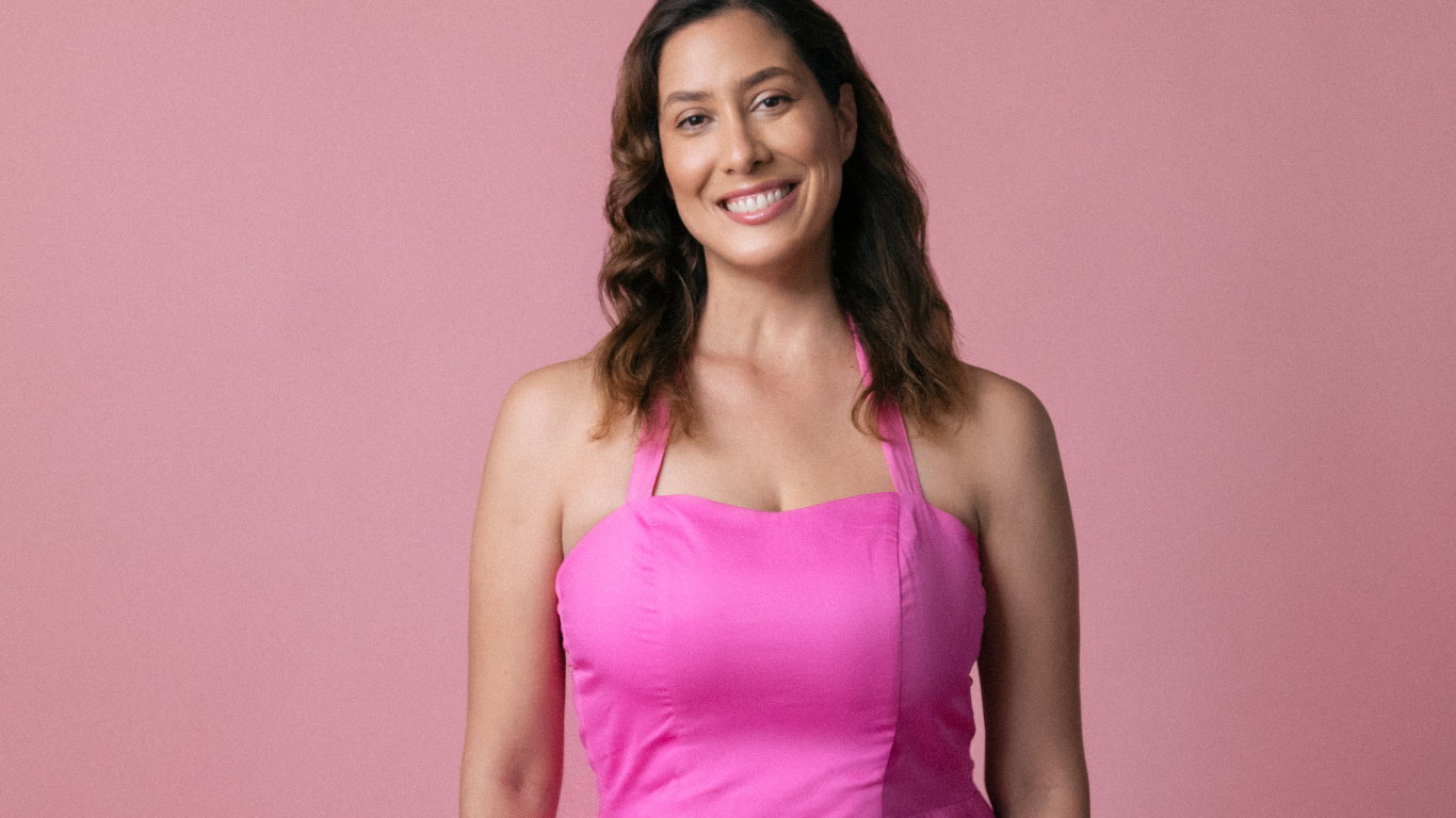 woman in pink dress smiling
