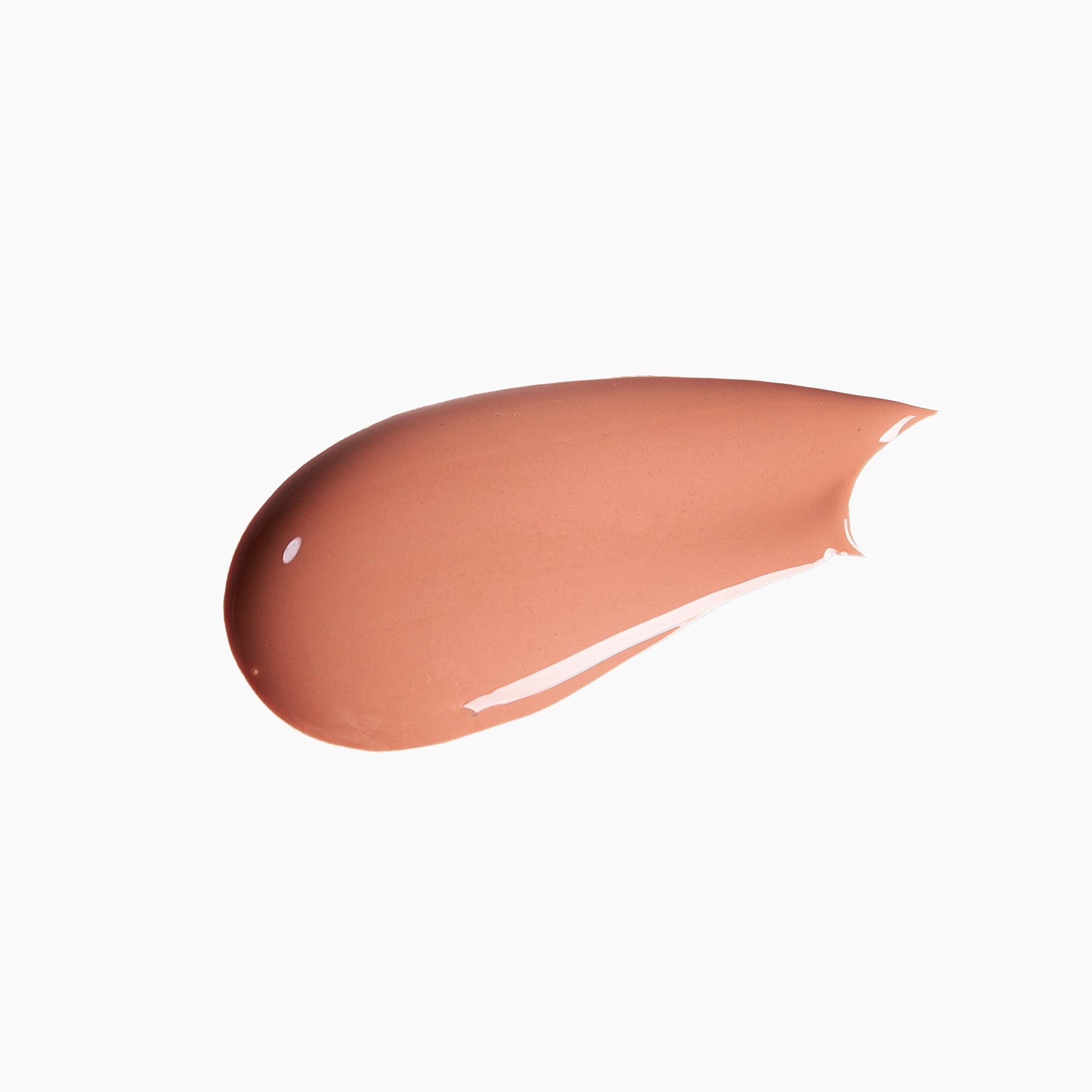 Swatch of nude connection lip gloss on a white background