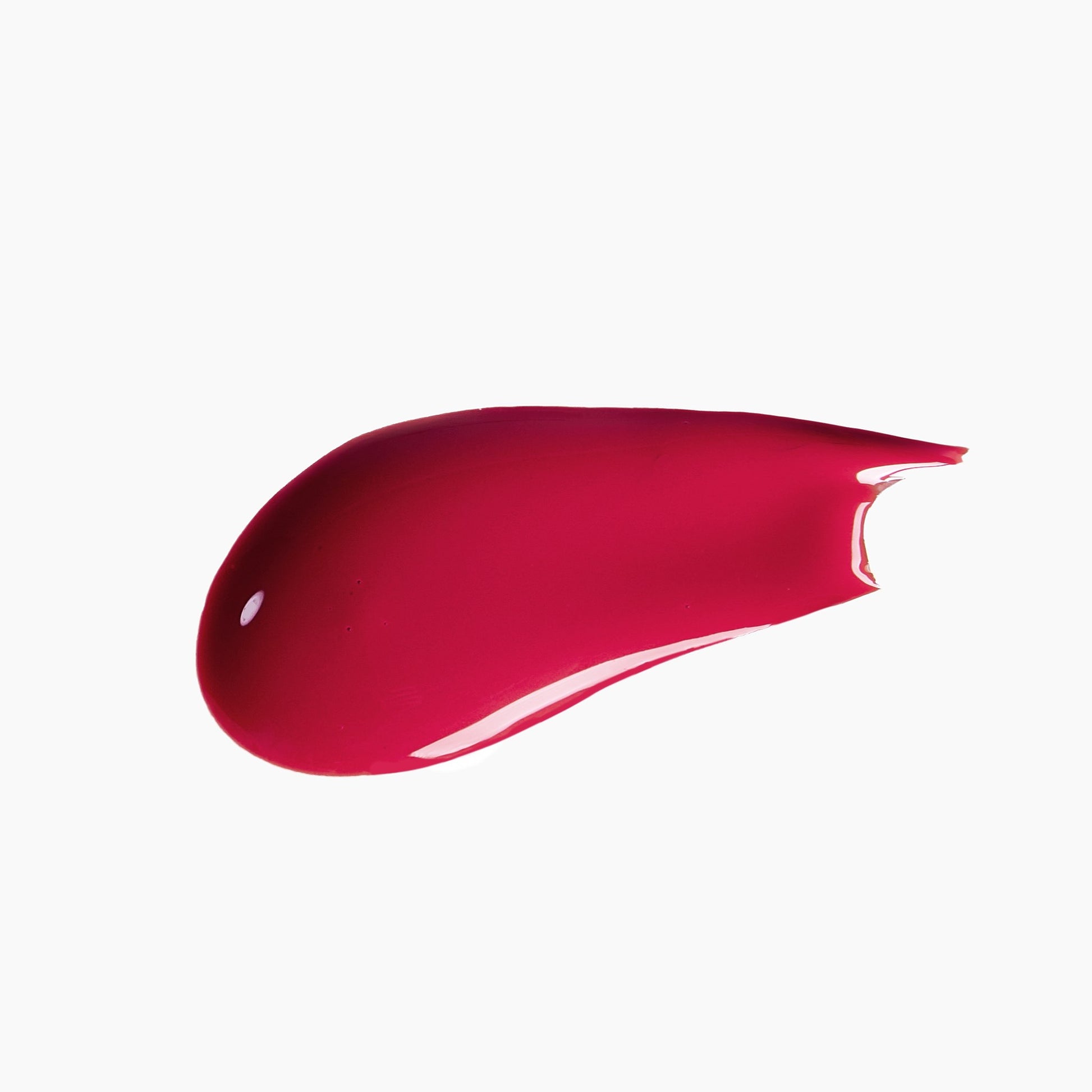 Swatch of red lipstick on a white background